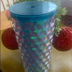 Blue tumbler- minus the straw. Beautiful blue.